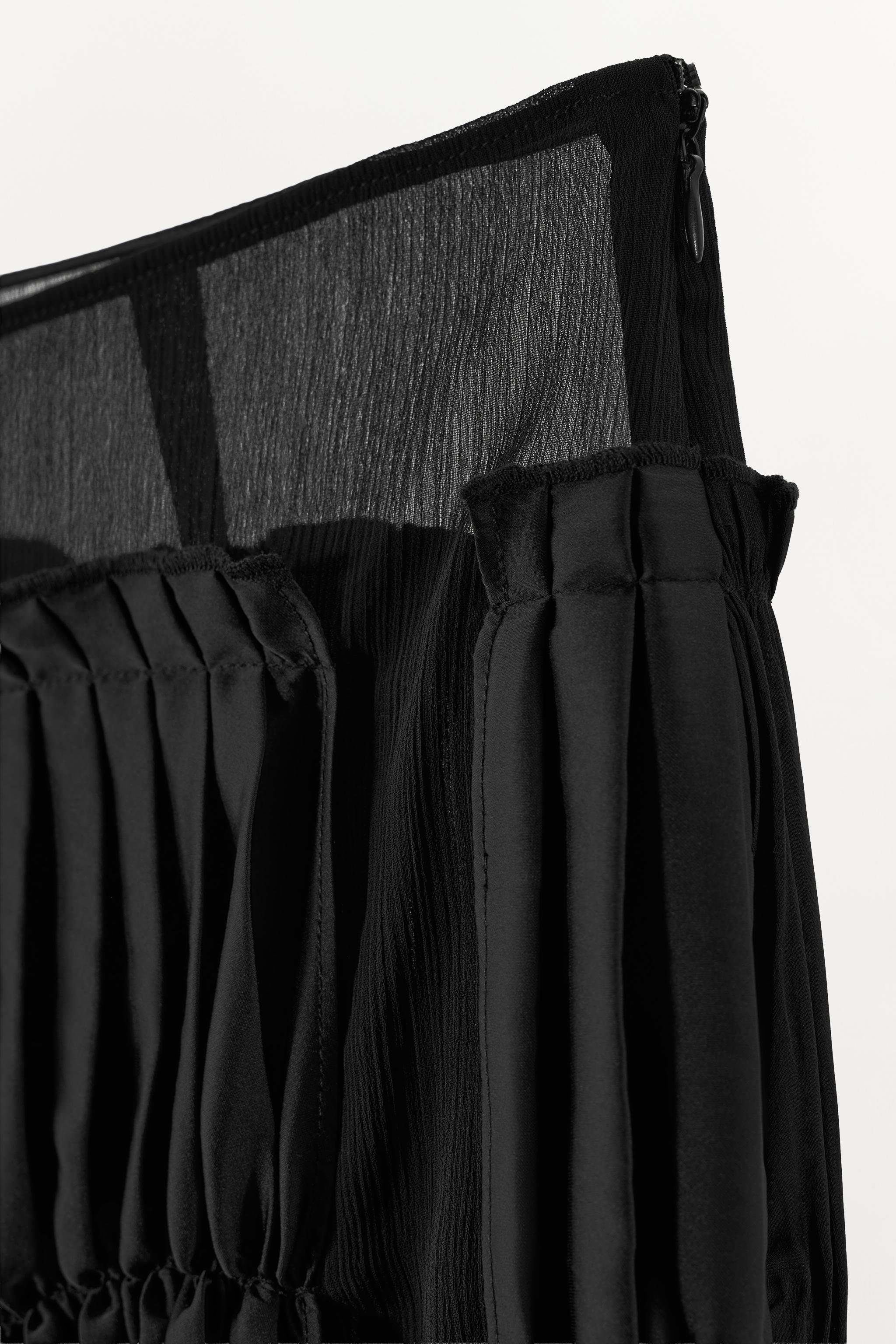 COMBINATION PLEATED MIDI SKIRT